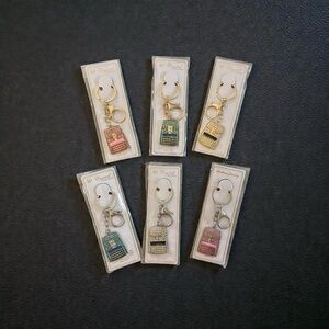 Source Unknown Gold, Silver, and Pink Key & Card Holder Set